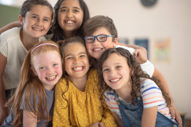 istock Happy bunch of elementary school kids 1167029038