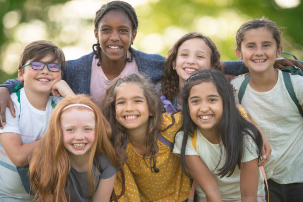 istock Portrait of a diverse group of elementary aged children 1167029200