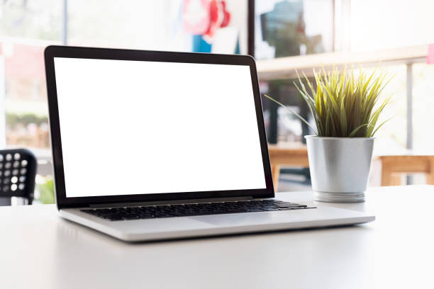 istock Blank screen Laptop computer and poster workspace background in modern office 1167031513