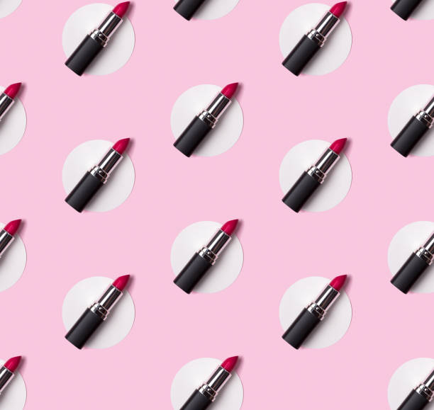 istock Pink lipstick seamless pattern on creative pastel pink background. 1167033290