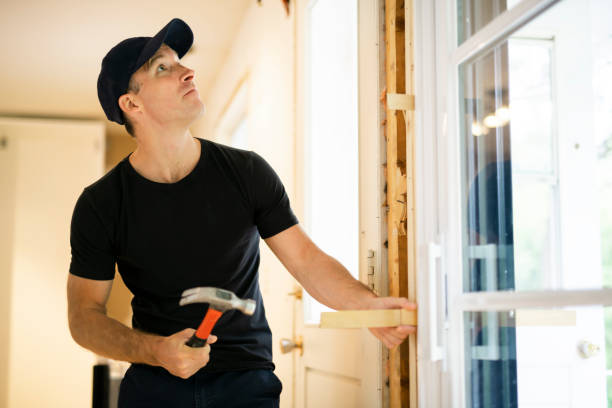 istock A handsome young man installing Double Sliding Patio Door in a new house construction site 1167036676
