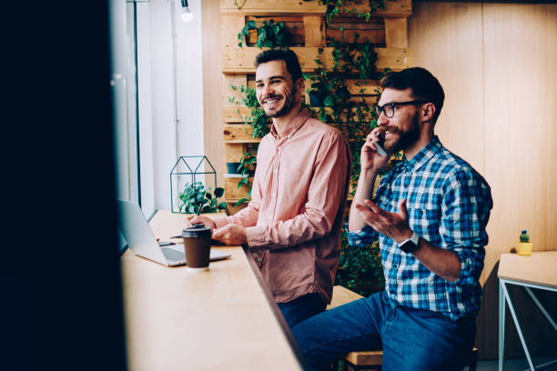 istock Happy cheerful remote workers feeling good from distance job on publicity area using modern technology for communicate online with business partners from business startup project connected to 4g 1167038101