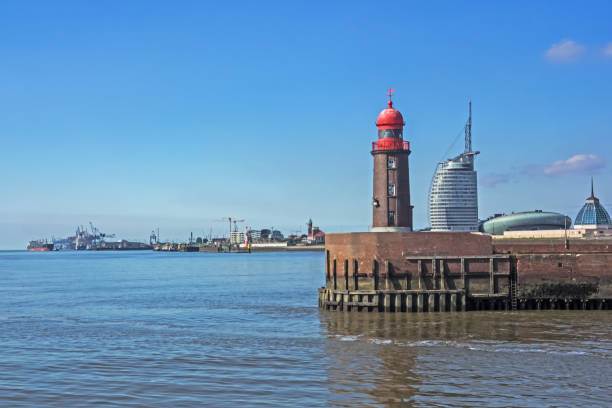 Bremerhaven, Germany - 2018/08/21: Cityscape of city Bremerhaven, Bremen, Germany on  august 21, 2018. Bremerhaven is located at the mouth of river Weser. There is a lighthouse on a pier, the Atlantic hotel sail city, the museum \