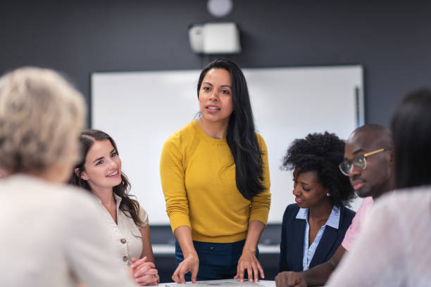 istock Confindent female manager discussing business strategy 1167040893