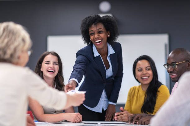 istock Successful female leader meeting with colleagues 1167040906