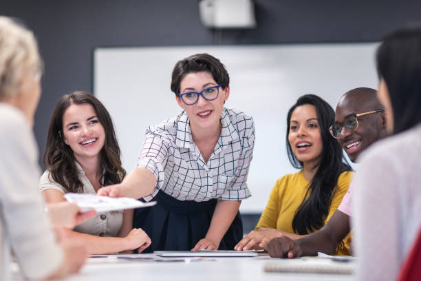 istock Confindent female manager discussing business strategy 1167040909