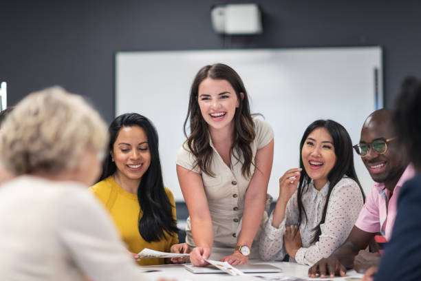 istock Successful female leader meeting with colleagues 1167041071