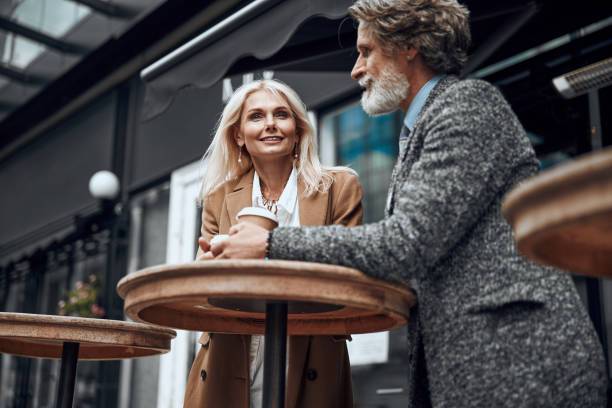 istock Couple at the cafe table outdoors stock photo 1167042492