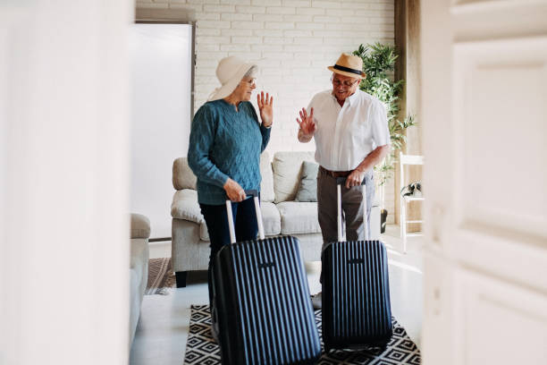 istock Senior couple standing and talking about vacation 1167043870