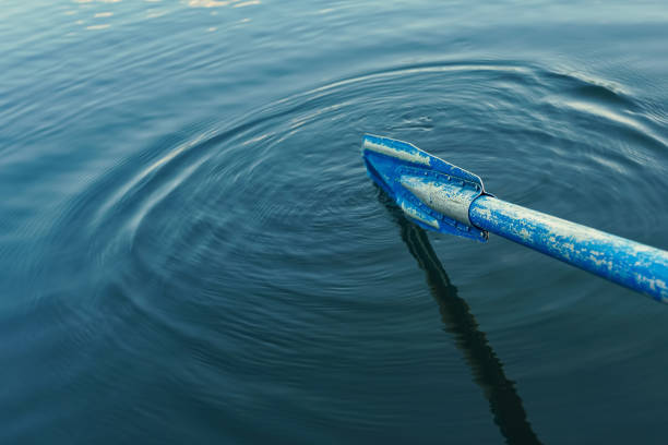 istock old blue oar in water waves backgrounds 1167044750