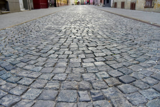 istock Texture of old stone street 1167045193