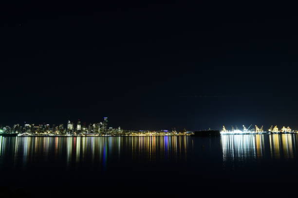 istock Beautiful Seattle Skyline Against Clear Night Sky 1167047391