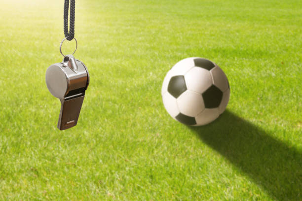 istock soccer background with wistle and ball 1167050025