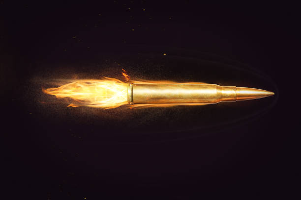 istock golden bullet flying on fire 1167050111