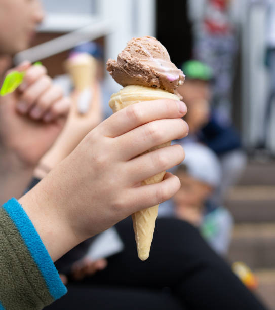 istock Ice cream in a child's hand 1167052172