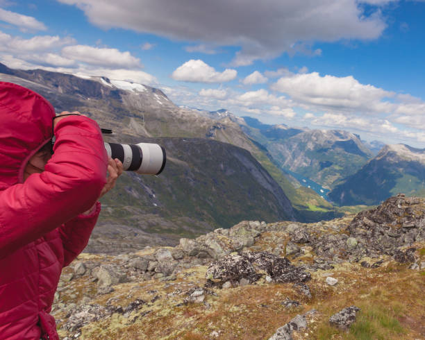istock Tourist taking photo from Dalsnibba viewpoint Norway 1167053958