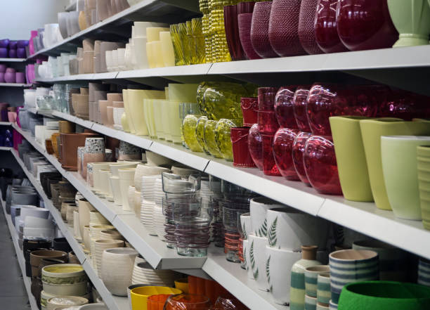 istock shelves with pots, garden store 1167056948