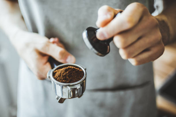 barista ready for making classic espresso - tamper imagens e fotografias de stock