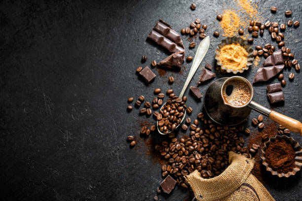 istock Cup of fresh made coffee on dark background 1167064345
