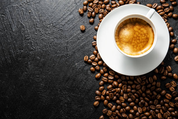 istock Cup of fresh made coffee on dark background 1167064402