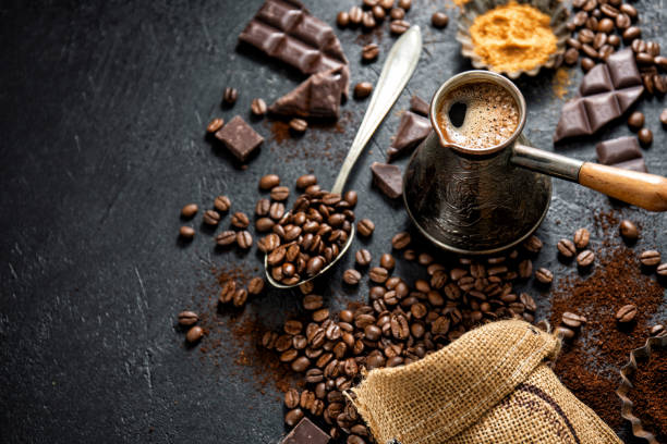 istock Cup of fresh made coffee on dark background 1167064739