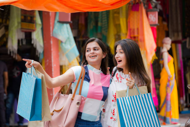 Friends enjoying the weekend in the shopping stock photo Shopping Bag, Girls, Bag, People, Friends, India, beautiful traditional indian girl stock pictures, royalty-free photos & images