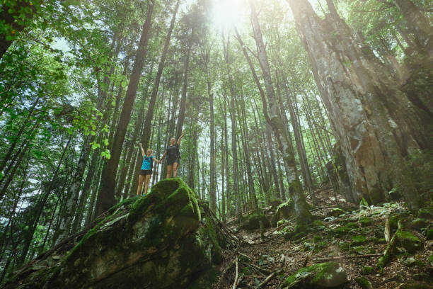 istock Friends enjoying victory in the forest! 1167066611