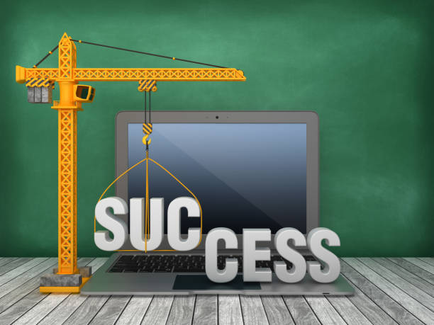 istock Tower Crane and Laptop with SUCCESS Word on Chalkboard Background - 3D Rendering 1167068328