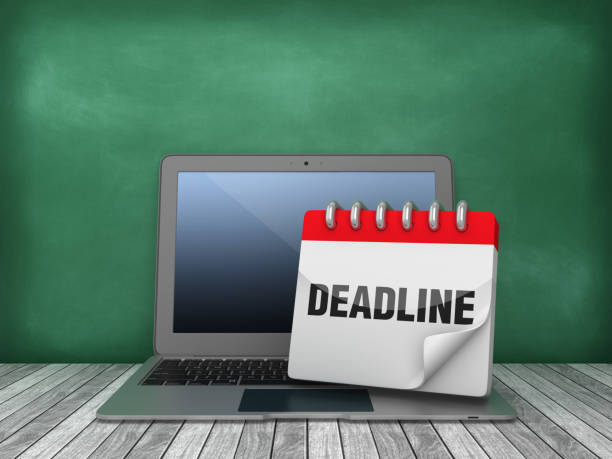 istock Laptop with Deadline Calendar on Chalkboard Background - 3D Rendering 1167068398