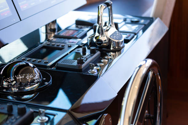 luxury yacht control panel with compass, cockpit with steering wheel, copy space - extreme sports audio imagens e fotografias de stock