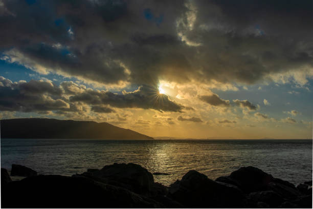 istock Islands and Sea with Sunset in the Background 1167075437