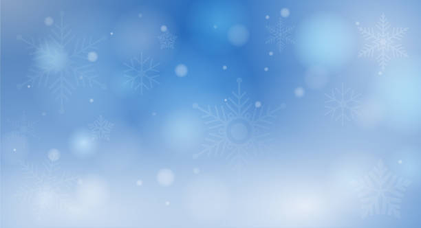 istock blue winter bokeh background with snowflakes and glowing circular lights 1167078255