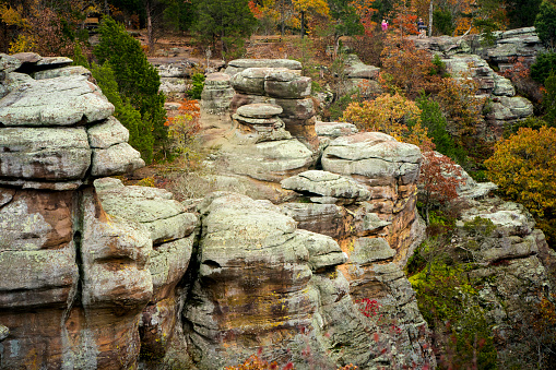Interesting  rock formations and giant boulders at Garden of the Gods among colorful orange colored leaves on an Autumn day, Shawneetown,  Midwest, Illinois, USA