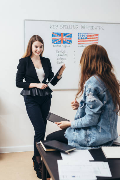 istock Learning English language, Female teacher near whiteboard giving lesson 1167088910