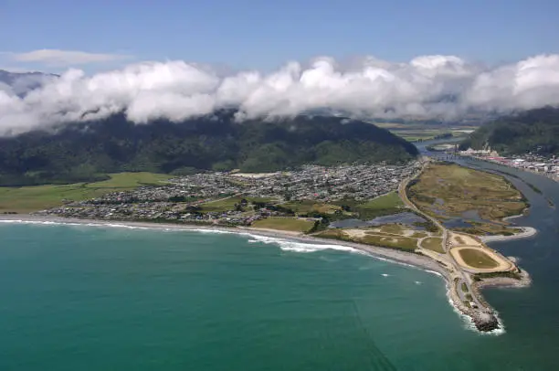 Aerial of Greymouth's suburb of Cobden and the mouth of the Grey River, West Coast, South Island, New Zealand.