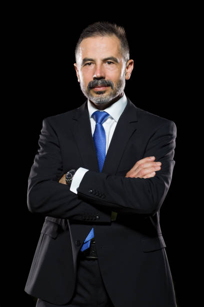 istock Confident man portrait on black background 1167097029