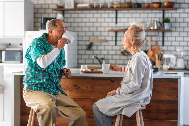 istock Senior Japanese Couple Enjoying Breakfast at Kitchen Counter 1167097031