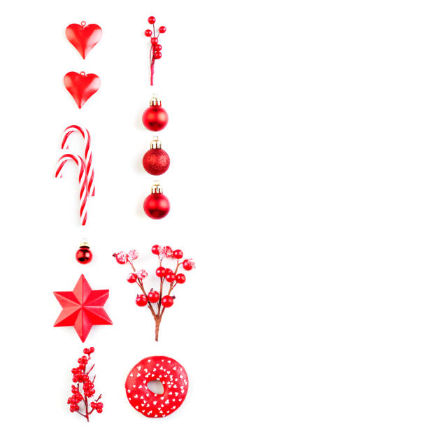 istock Christmas composition with red decor. Christmas red decorations, baubles and candy isolated on white background. Flatlay top view 1167097319