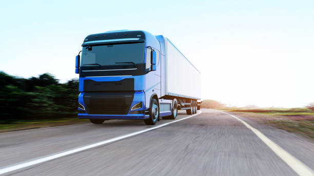 istock semi-truck with trailer driving on road 1167097911