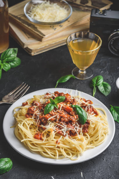 istock Spaghetti with bolognese sauce, parmesan and basil 1167098554