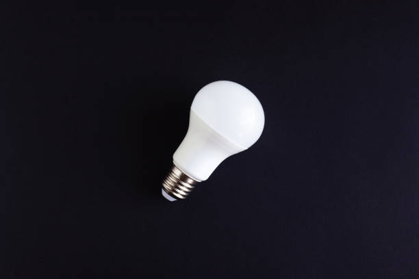 istock white LED Eco lamp on a black background 1167099201