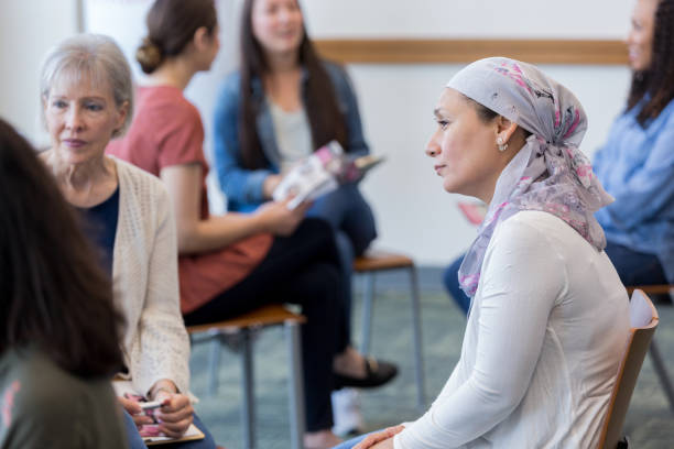 istock In small group, women look compassionately at unseen member 1167108424