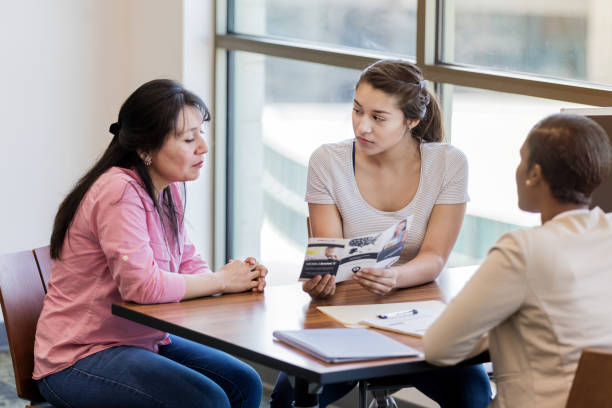 istock As banker explains, mother and daughter seriously consider loan 1167108638