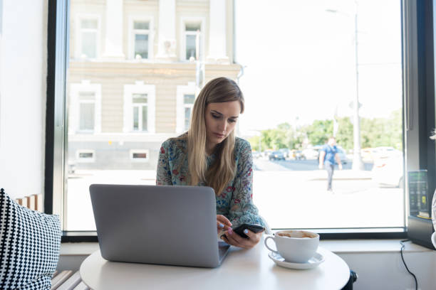 istock Woman takes break from telecommuting to check text messages 1167109480