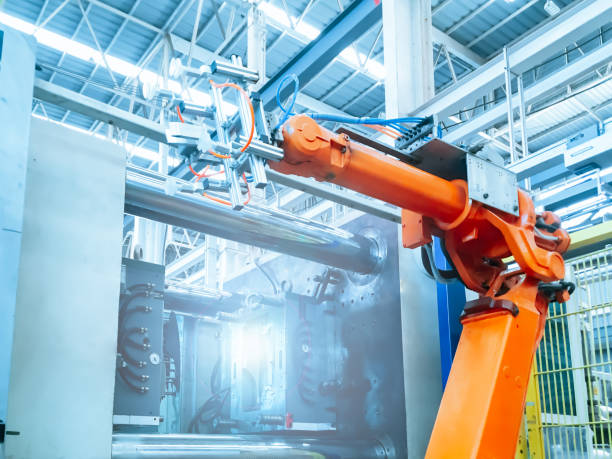 istock Smart factory industry 4.0 concept from robotic arm machine tool for production line of injection molding process at vehicle industrial factory. 1167116288