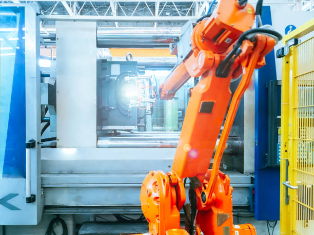 istock Smart factory industry 4.0 concept from robotic arm machine tool for production line of injection molding process at vehicle industrial factory. 1167116302