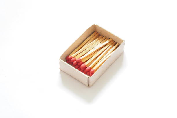 istock Matches in open match-box on Copy space and white background 1167118953