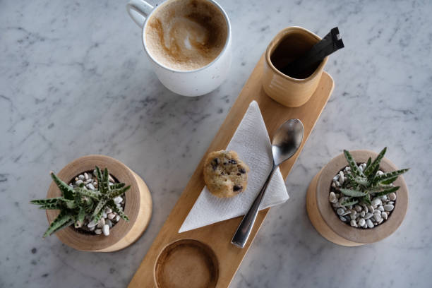 istock Cup of coffee with sugar, cookie, top view. Coffee arrangment in cafe 1167121922