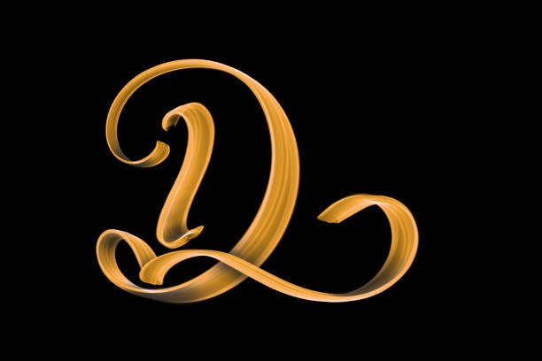 istock Golden capital letter D isolated on black with copy space - hand lettering 1167127548