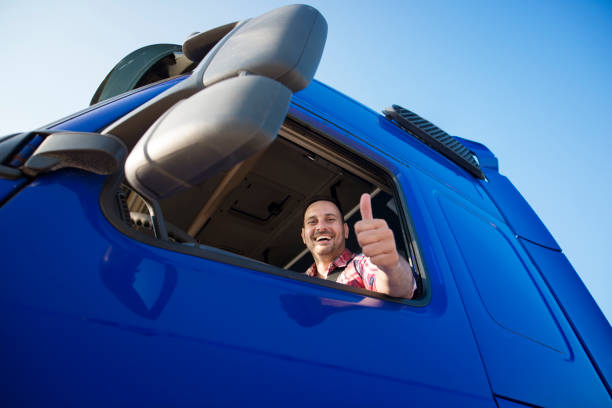 istock Happy truck driver showing thumbs up. 1167131809